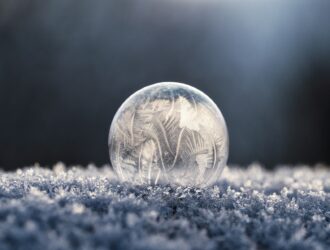 focus photo of round clear glass bowl