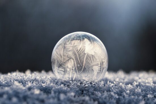 focus photo of round clear glass bowl